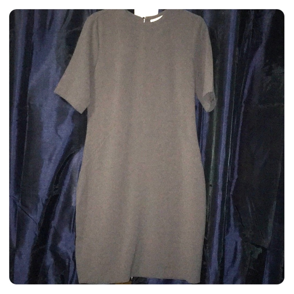 HM grey dress, open back, knee length.